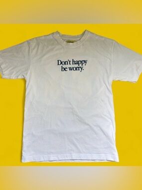 Funny graphic tee with smiley face on the back
